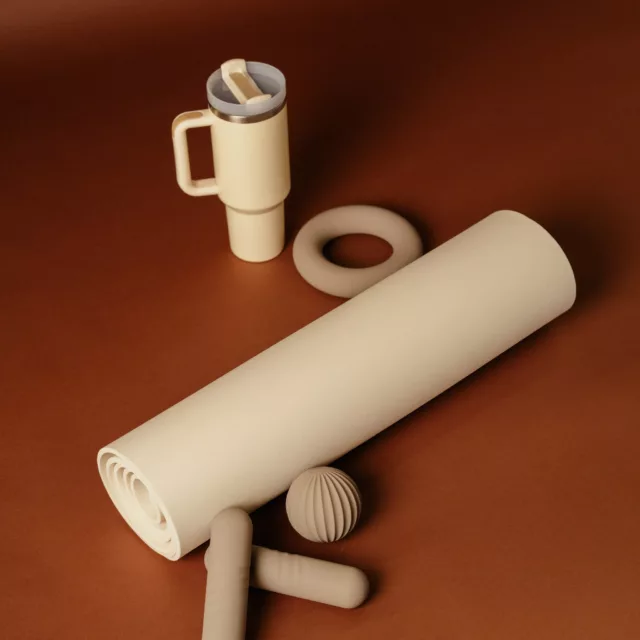 Insulated water bottle with handle, rolled yoga mat, ring, ball and light weights in sand tones, bespoke sport set